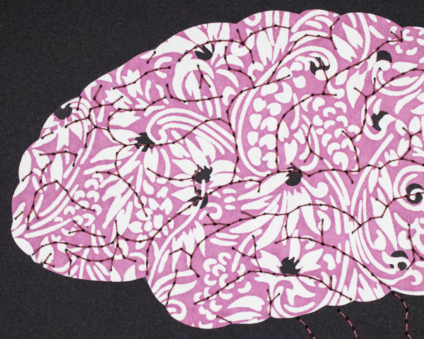 Brain in lilac, white, and silver filigree