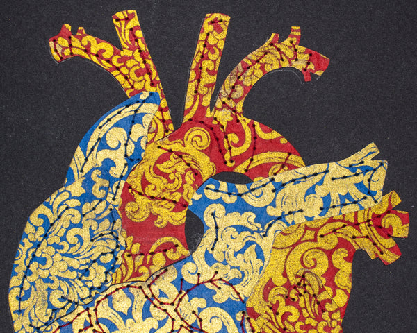 Heart in gold on blue & red