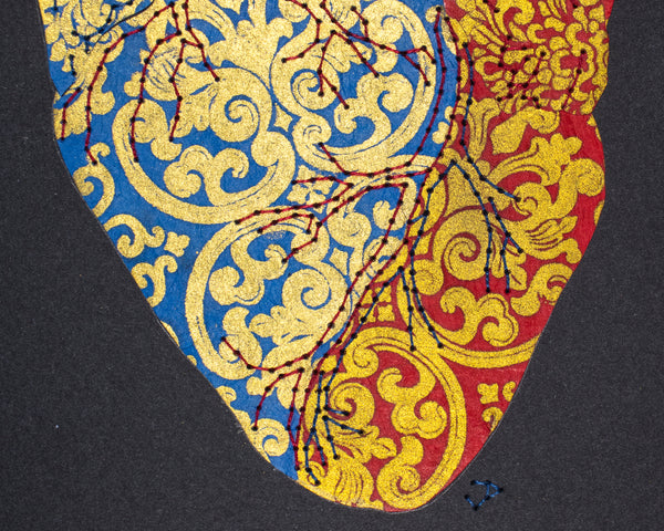 Heart in gold on blue & red