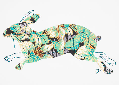 Rabbit in Green Leaves on Black