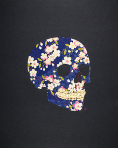Skull in pink flowers on blue
