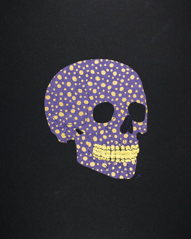 Skull in gold dots on purple