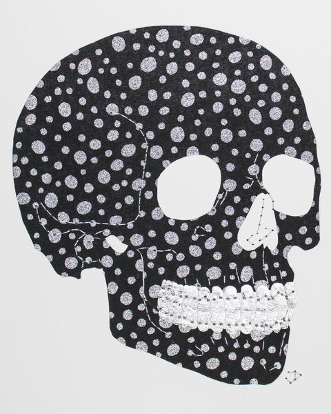 Skull in silver dots on black