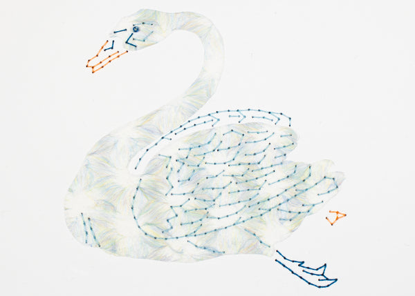 Swan in white with pale coloured fibres