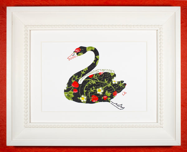 Swan in strawberries on black