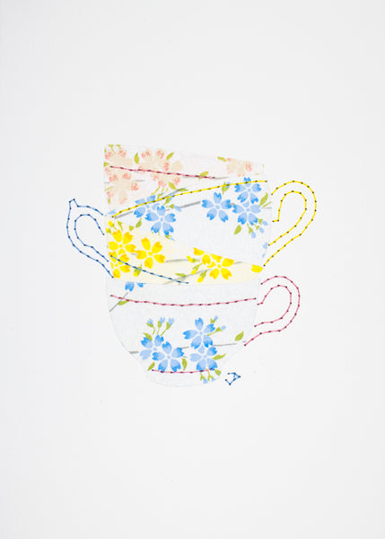 Teacup stack in flowers