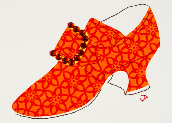 Hand-stitched 1760s shoe in red paper patterned in orange and accented with a rhinestone buckle